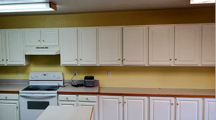 Kitchen cabinet refinishing by Red Barn Painting