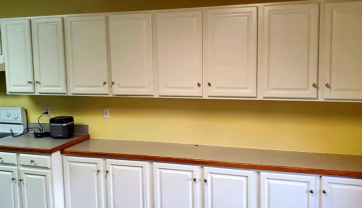 Kitchen cabinet refinishing by Red Barn Painting