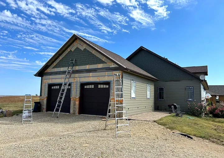 Exterior house painting by Red Barn Painting