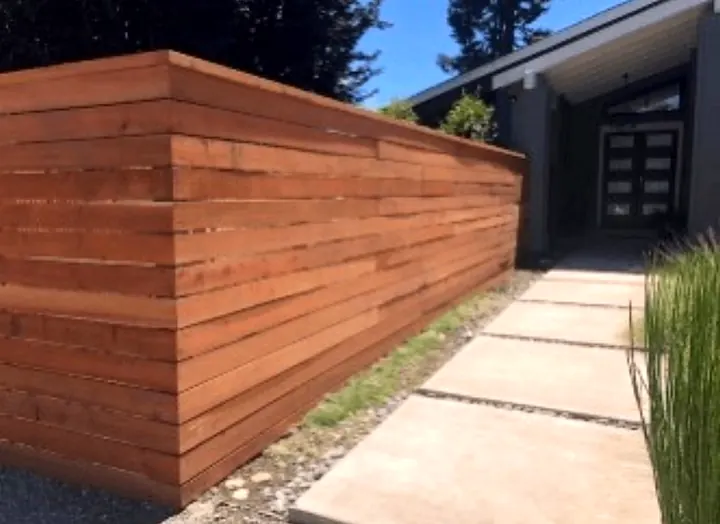 Fence staining by Red Barn Painting