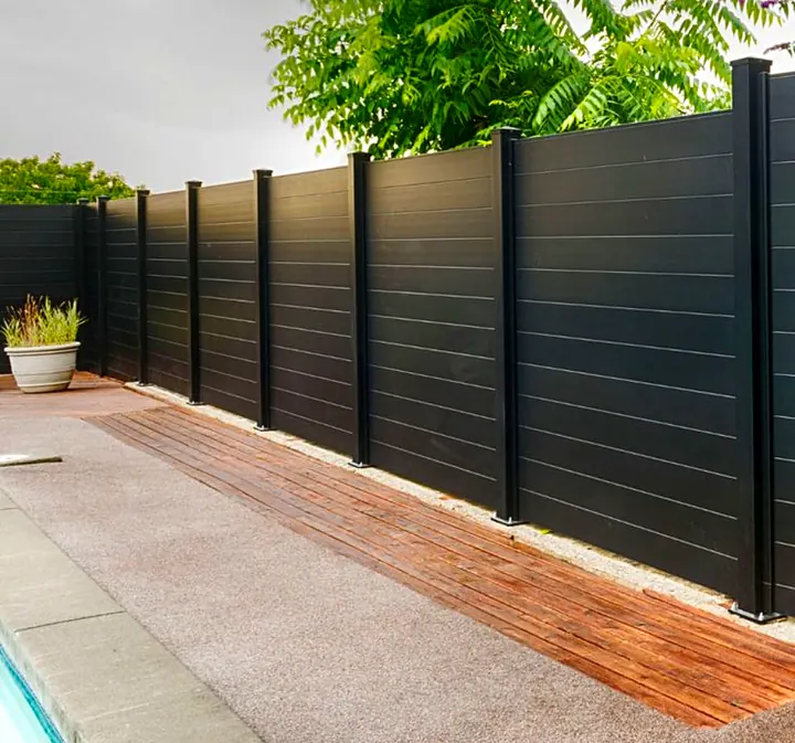 Fence staining by Red Barn Painting