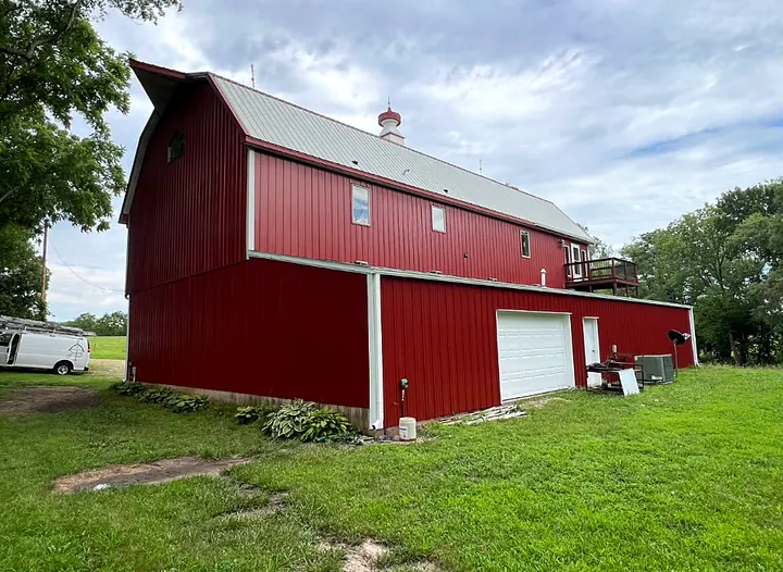 Metal building painted by Red Barn Painting
