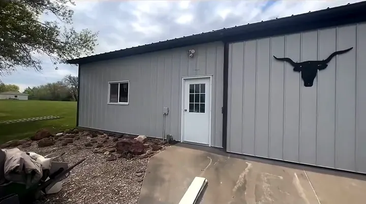 Metal building painted by Red Barn Painting