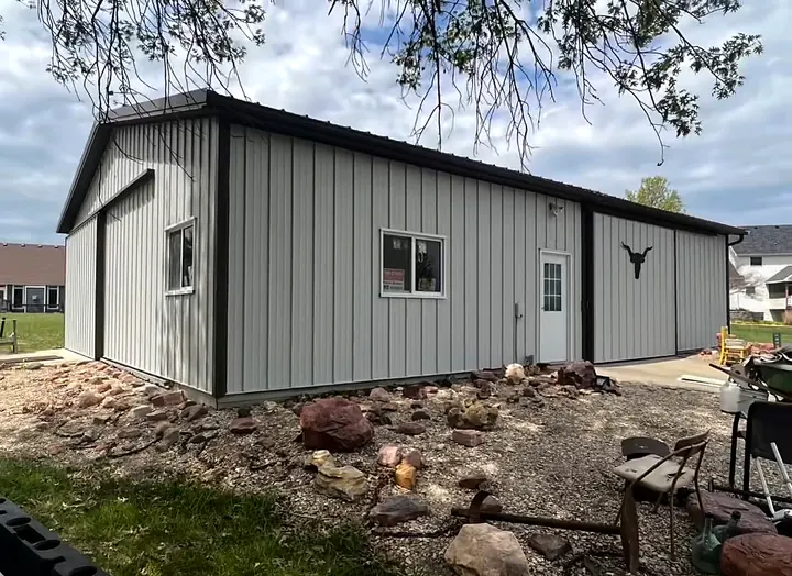 Metal building painted by Red Barn Painting