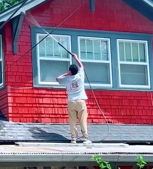 Pressure washing a home