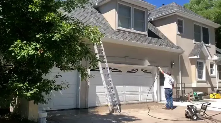 Pressure washing a home